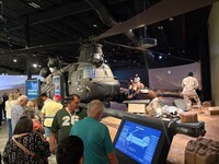 Tennessee Wings of Liberty Museum docents — mostly military veterans — lead visitors through a flight simulation on a refurbished MH-47 Chinook helicopter. Photo courtesy of Alison Ramsey.