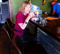 The author samples some of the local moonshine in Franklin County, Virginia. Photo courtesy of Victor Block.