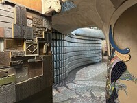  The hallway to St. Louis' City Museum's elevator is embedded with stainless steel buffet pans, architectural fragments, handmade mosaics from reclaimed tiles and antique letterpress printing plates salvaged from old print shops. Photo courtesy of Alison Ramsey. 