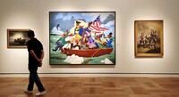  A viewer considers Robert Colescott's "George Washington Carver Crossing the Delaware: Page From an American History Textbook" at the Lucas Museum of Narrative Art in Los Angeles, California. Photo courtesy of Jim Farber. 