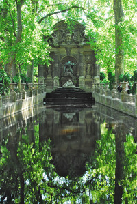 The Medici Fountain in Paris' Luxembourg Gardens sits in a classic green grotto. Photo courtesy of Priscilla Lister.