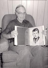 Pat McMahon, rescued by JFK on the PT-109 during World War II, shows some of his Kennedy memorabilia in 1983. Photo courtesy of Sharon Whitley Larsen.