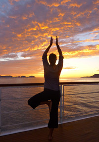 Leah Webb practices yoga on a deck of the Safari Endeavour in Mexico's Sea of Cortez. Photo courtesy of Jim Farber. 