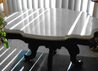  Marble-top table is circa 1875. 