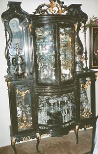  Victorian china cabinet was made around 1890. 