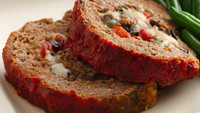  Fresh basil, provolone cheese and olives are among the tasty ingredients that stuff this delicious meat loaf. 