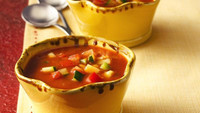 Tomato-based gazpacho is one of the most well-known chilled soups, but imagination can turn just about any seasonal fruit or vegetable into a delicious cold soup first course.