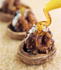  Honey drizzled over spicy stuffed walnuts is an excellent food pairing with apple cider. 
