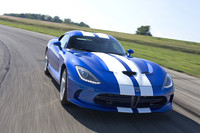  The new 2014 Viper is still badged as an SRT model, but it returns to the garage of Dodge next year. 