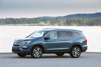  The new Pilot is a ground-up redesign that is 3.5 inches longer but 300 pounds lighter than the 2015 model. 