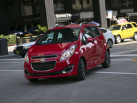 The Spark has five doors with the look of a three-door. Its "hidden" rear door handles are in the upper part of the back door.