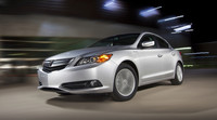  The 2014 ILX Hybrid compact sedan comes with keyless locking with push-button ignition, Pandora radio interface and a SMS text message function. 