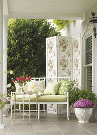  Screen star for summer: A flower-strewn wallpapered screen politely blocks the neighbors' view Photo: Courtesy York Wallcoverings. 