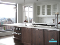  Mirror, mirror on the wall &#8212; and refrigerator &#8212; makes the visual utmost of the spectacular scenery outside this New York kitchen. Photo Courtesy Townhouse Kitchens. 