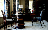  Furnishing designs mined from the past for present-day living imbue a sitting room with timeless charms. Photo: Courtesy Jonathan Charles Fine Furniture. 