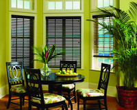  Tailored wood blinds leverage brilliant color in a small room that makes a design statement far larger than its floorspace. Photo: Courtesy Budget Blinds. 
