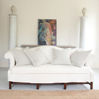 "Symmetrical balance and uncluttered space evoke peace and calm punctuated only by modern art. Photo: Kindra Clineff."