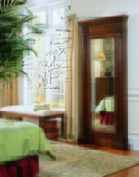  Door with a secret: Who knows what riches lie behind this mirror? Certainly not a jewelry thief! Photo Courtesy Hooker Furniture 