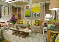  Ingenuity and a fresh take on beige let a small living room live large ... and colorfully. Photo: Edgar Scott 