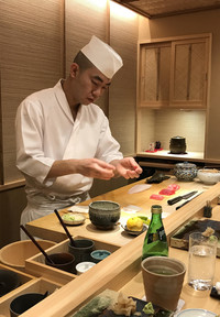  The chef at Sushi Iwa in Tokyo prepares a meal. Photo courtesy of Phillip Courter. 