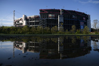 The Bristol Motor Speedway is reflected in a puddle at the camping site on May 2. Photo credit Michael Rayne Swensen.