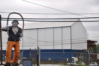 Statue of Joe Magarac, a folktale steelworker who could bend steel with his bare hands, in front of the 148-year-old Edgar Thomson Works. Photo credit Shannon Venditti.