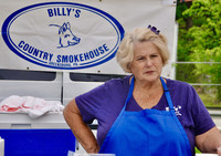 Shirley Stana, owner of Billy's Country Smokehouse, speaks to customers at a Westmoreland County farmers market. Photo credit Shannon Venditti.
