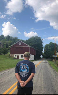 SHANKSVILLE — Frank Siller walks towards the site where Flight 93 went down on September 11, 2001. Photo Credit Salena Zito.