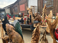 Several chainsaw craftsmen and artisans displayed their work outside the old tannery at Mountain Fest.